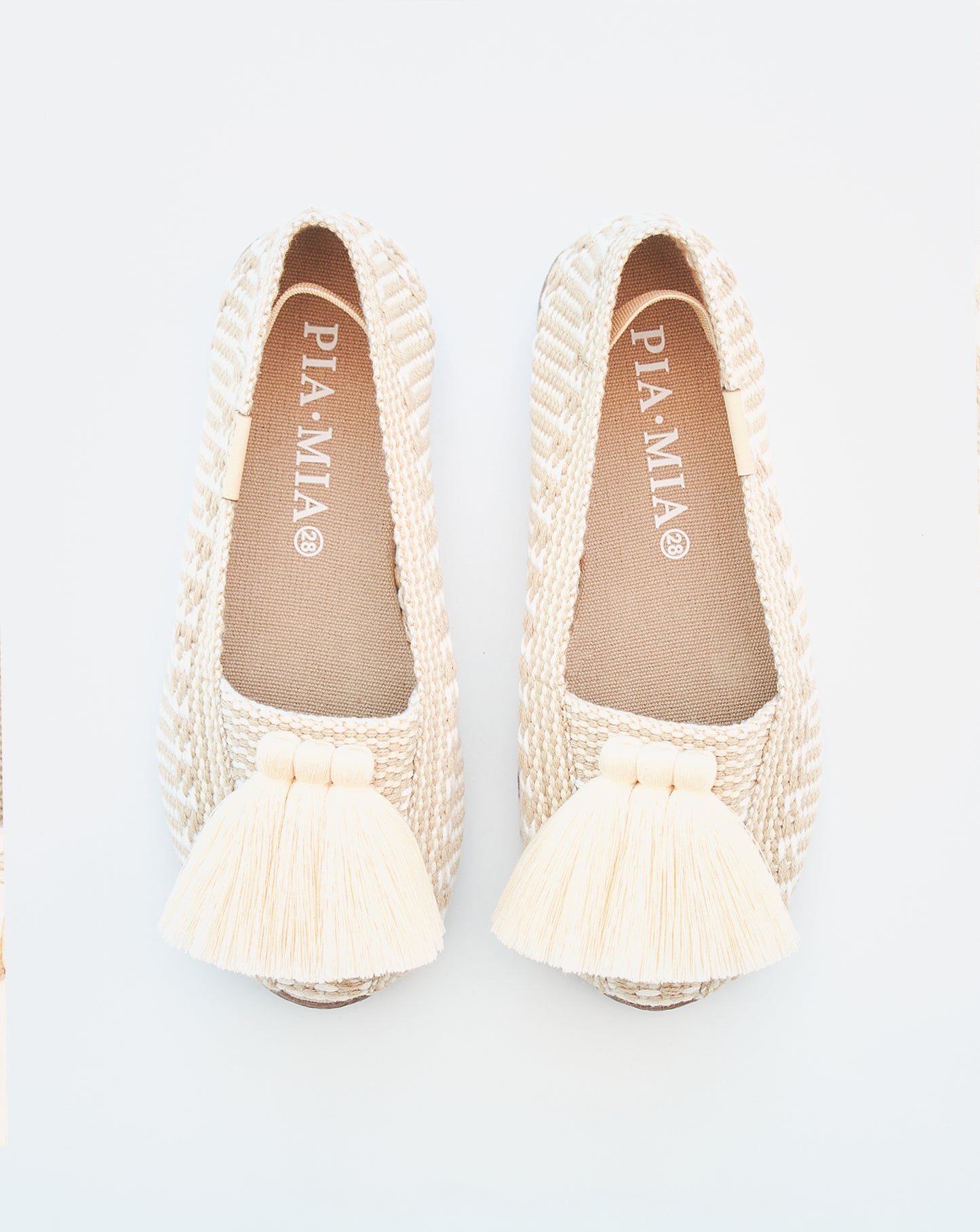 Alpargatas tejidas con pompones tallas 26-33 Daily cream KIDS